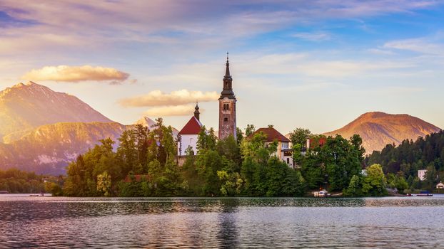 Lake Bled Slovenia. Beautiful mountain lake with small Pilgrimage Church. Most famous Slovenian lake and island Bled with Pilgrimage Church of the Assumption of Maria. Bled, Slovenia, Europe. 
