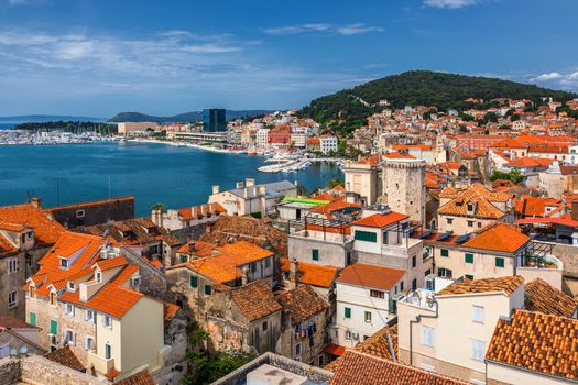 Split waterfront and Marjan hill aerial view, Dalmatia, Croatia. Panoramic summer cityscape of old medieval city Split, Croatia, Europe.  Traveling concept background. 
