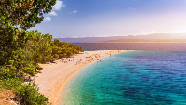 Beautiful panorama of famous Adriatic beach Zlatni Rat (Golden Cape or Golden Horn) with turquoise water , Island of Brac Croatia summertime. Famous Adriatic beach Zlatni Rat in Bol, Brac, Croatia.