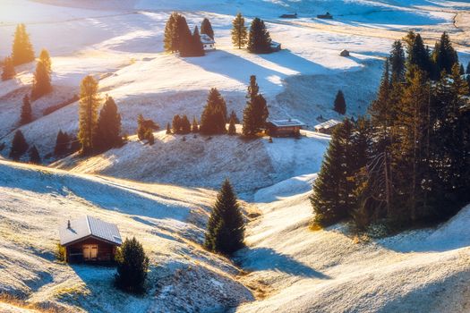 Alpe di Siusi or Seiser Alm with Sassolungo, Langkofel mountain group in background. Alpe di Siusi or Seiser Alm, Sassolungo and Sassopiatto mountains, Trentino Alto Adige, Sud Tyrol, Italy, Europe.