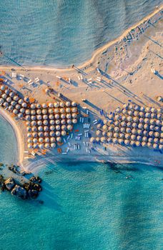 Aerial view of beautiful tropical Elafonissi Beach with pink sand. View of a nice tropical Elafonissi beach from the air. Beautiful sky, sea, resort. Elafonissi beach, Crete, Greece.