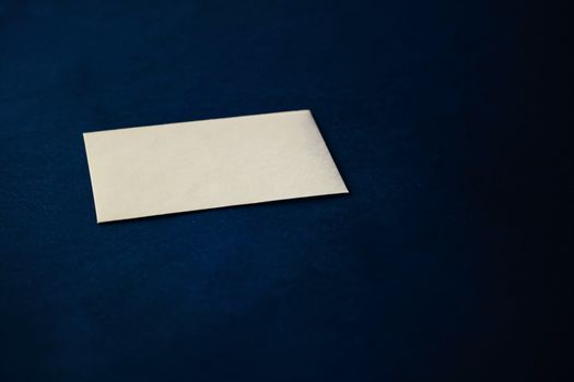 Blank beige paper card on blue background, premium business and luxury brand identity mockup