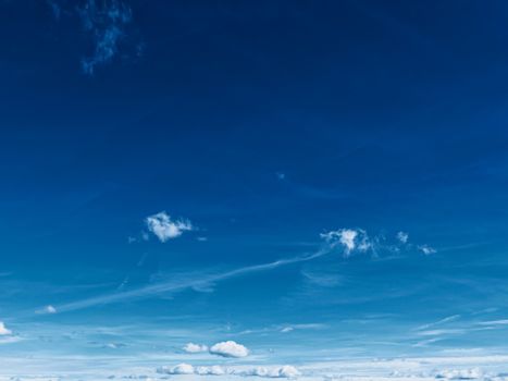 Bright blue sky with clouds, nature and environmental background