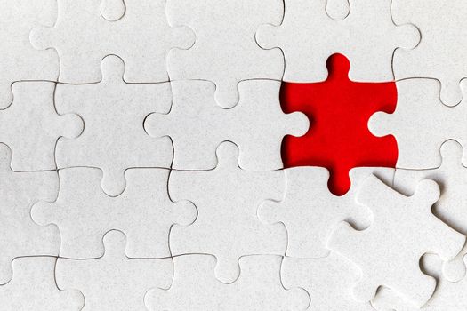 Jigsaw puzzle with missing piece. Missing puzzle pieces. Concept image of unfinished task. Completing final task, missing jigsaw puzzle pieces and business concept with a puzzle piece missing.