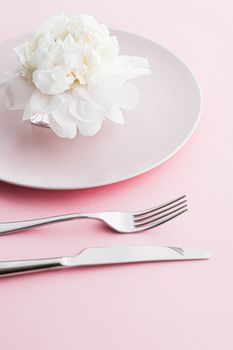 Dining plate and cutlery with peony flower as wedding decor set on pink background, top tableware for event decoration and dessert menu design