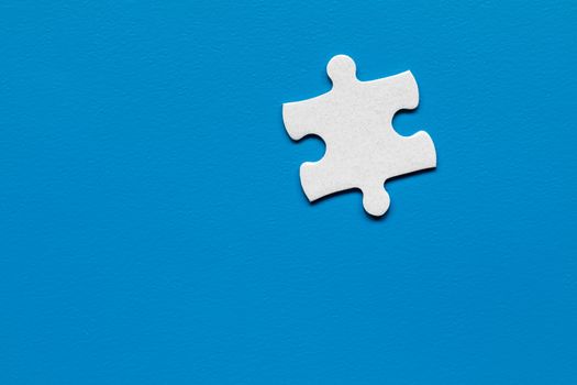 Closeup of jigsaw puzzle isolated. Missing jigsaw puzzle piece, business concept for completing the puzzle piece. Group of puzzle and a puzzle piece. Teamwork concept. Think difference concept. 