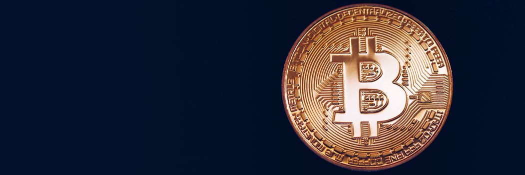 Crypto currency golden coin with bitcoin symbol on isolated on black background. Bitcoin Coin on black background. Bitcoin cryptocurrency.  Cryptocurrency Coin Concept.
