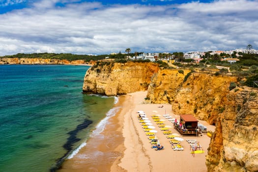 Careanos Beach (Praia dos Careanos) in Portimao, Algarve, Portugal. Concept for travel in Portugal and summer vacations in Portimao, Algarve, Portugal. 