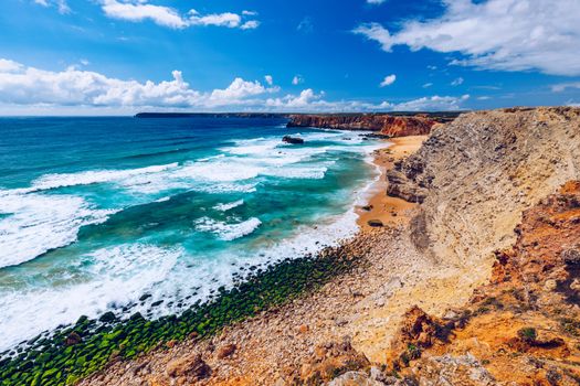 Panorama view of Praia do Tonel (Tonel beach) in Cape Sagres, Algarve, Portugal. Praia Do Tonel, beach located in Alentejo, Portugal. Ocean waves on Praia Do Tonel beach. View from Sagres fortress.