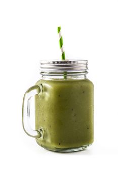 Healthy green smoothie with spinach,mint, kiwi, ginger and green apple isolated on white background