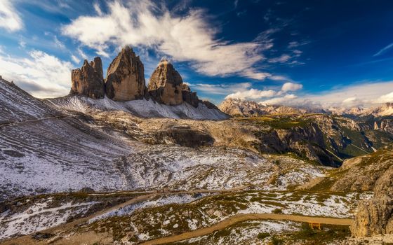 View of the National Park Tre Cime di Lavaredo, Dolomites, South Tyrol. Location Auronzo, Italy, Europe. Dramatic cloudy sky. Beauty world.