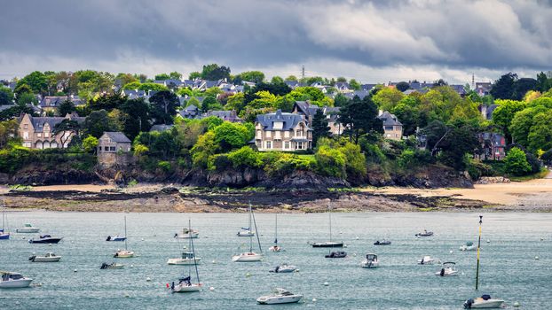 View of Dinard city with coastline full of boats. Brittany, France