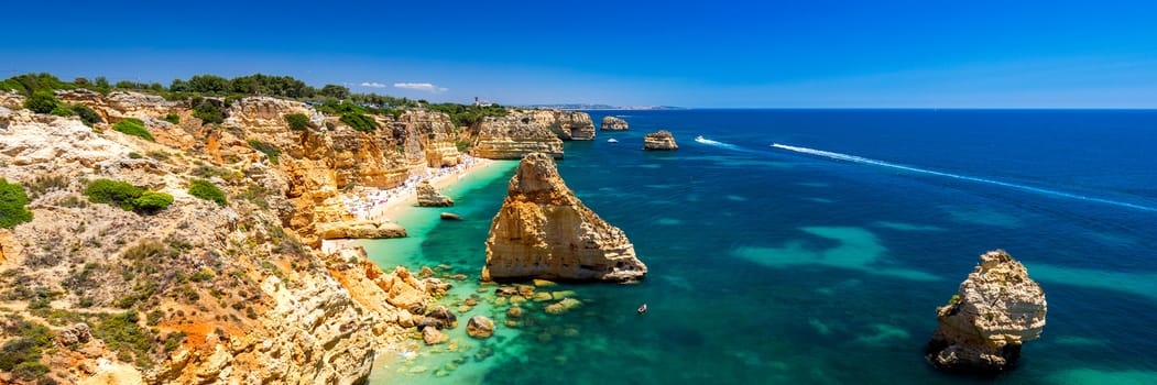 Praia da Marinha, beautiful beach Marinha in Algarve, Portugal. Navy Beach (Praia da Marinha), one of the most famous beaches of Portugal, located on the Atlantic coast in Lagoa Municipality, Algarve.