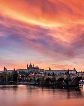 Charles Bridge at sunset with colorful sky, Prague, Czech Republic. Prague old town and iconic Charles bridge and Castle, Czech Republic. Charles Bridge (Karluv Most), Old Town Tower and Castle.