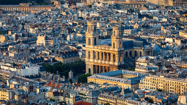 Saint Sulpice Church highlighted by the sun. Built in 1754 Eglise Saint-Sulpice is one of the biggest churches in Paris. Saint-Germain-des-Pres district, Place Saint-Sulpice, Paris, France