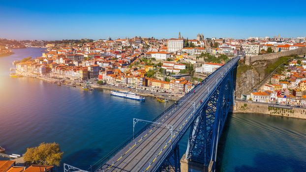 Panoramic view of Old city of Porto (Oporto) and Ribeira over Douro river, Portugal. Concept of world travel, sightseeing and tourism.
