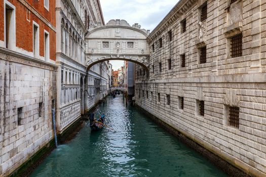 Canal with gondolas in Venice, Italy. Architecture and landmarks of Venice. Venice postcard with Venice gondolas.