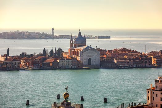 Venice panoramic aerial view with red roofs, Veneto, Italy. Aerial view with dense medieval red roofs of Venice, Italy 