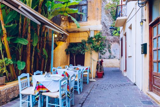 Street in the old town of Chania, Crete, Greece. Charming streets of Greek islands, Crete. Beautiful street in Chania, Crete island, Greece. Summer landscape. Chania old street of Crete island Greece.