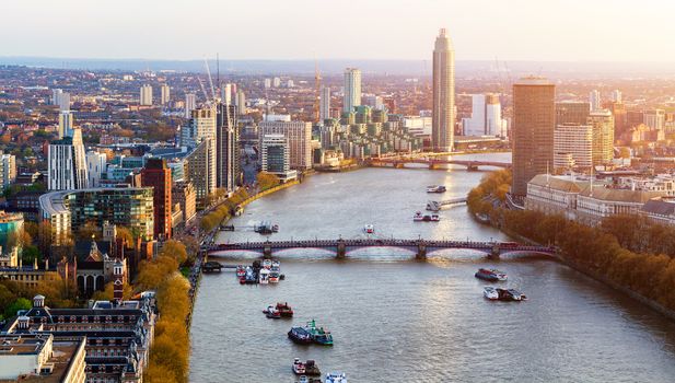 Aerial panorama view on London. View towards Houses of Parliament, London Eye and Westminster Bridge on Thames River.