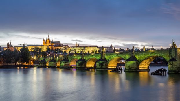 Famous iconic image of Prague castle and Charles Bridge, Prague, Czech Republic. Concept of world travel, sightseeing and tourism.