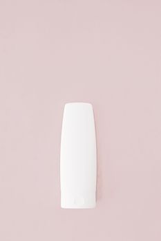 Moisturizing hand cream or body lotion on pink background, beauty product and skin care cosmetics, flatlay