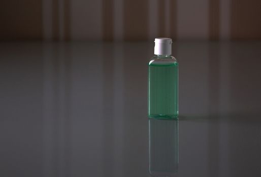 Bottle with antimicrobal gel for hand clean and corona virus protection. Empty space

