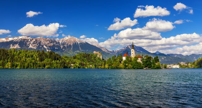 Lake Bled Slovenia. Beautiful mountain lake with small Pilgrimage Church. Most famous Slovenian lake and island Bled with Pilgrimage Church of the Assumption of Maria. Bled, Slovenia, Europe. 