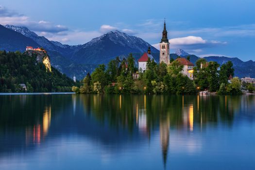Lake Bled Slovenia. Beautiful mountain lake with small Pilgrimage Church. Most famous Slovenian lake and island Bled with Pilgrimage Church of the Assumption of Maria. Bled, Slovenia, Europe. 