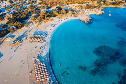 Aerial view of beautiful tropical Elafonissi Beach with pink sand. View of a nice tropical Elafonissi beach from the air. Beautiful sky, sea, resort. Elafonissi beach, Crete, Greece.