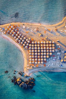 Aerial drone shot of beautiful turquoise beach with pink sand Elafonissi, Crete, Greece. Best beaches of Mediterranean, Elafonissi beach, Crete, Greece. Famous Elafonisi beach on Greece island, Crete.