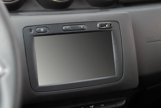 Modern car dashboard. Screen multimedia system. Interior detail