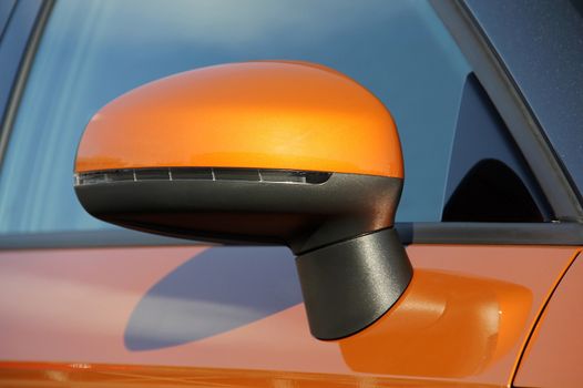 Side mirror with turn signal of a luxury car