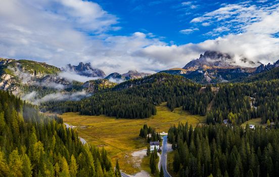 Lago di Landro, lake in the Dolomites in South Tyrol, Italy. Autumn peaceful alpine lake Durrensee or Lago di Landro. Mountains above the lake Lago di Landro. In the fall, Dolomites, Italy.