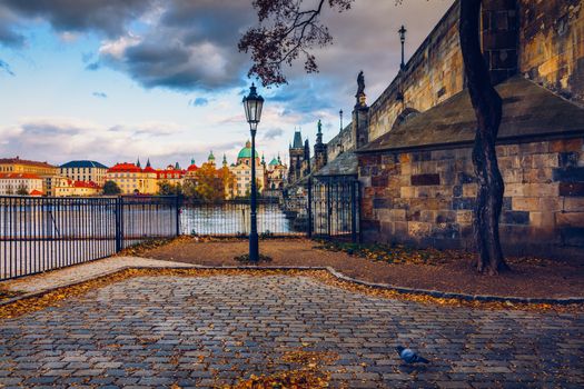 Charles Bridge in Prague in Czechia. Prague, Czech Republic. Charles Bridge (Karluv Most) and Old Town Tower. Vltava River and Charles Bridge. Concept of world travel, sightseeing and tourism.