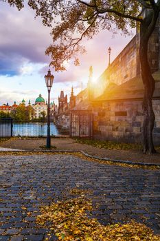 Famous Landmark, Lantern and Charles Bridge, Prague, Czech Republic. Antique lantern in the center of Prague, Charles Bridge. Cityscape of the historic center, Prague. Charles Bridge at sunset.