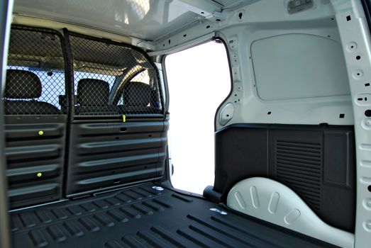 Inside commercial van with opet side door