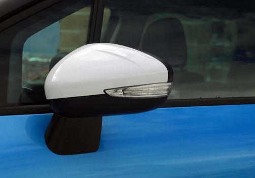 Side mirror with turn signal of a luxury car