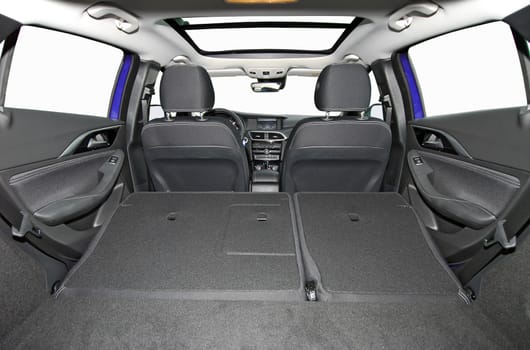 passenger car trunk with rear seats folded