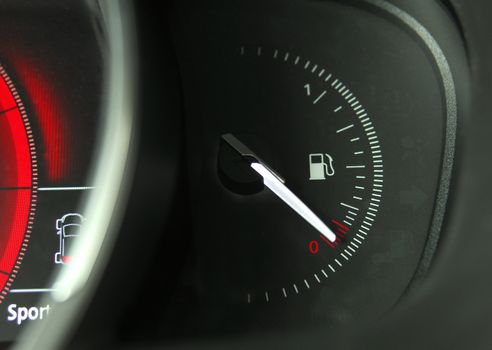 Close-up shot of a fuel gauge in a car