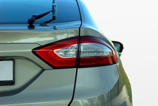 the tail lights on a luxury passenger car