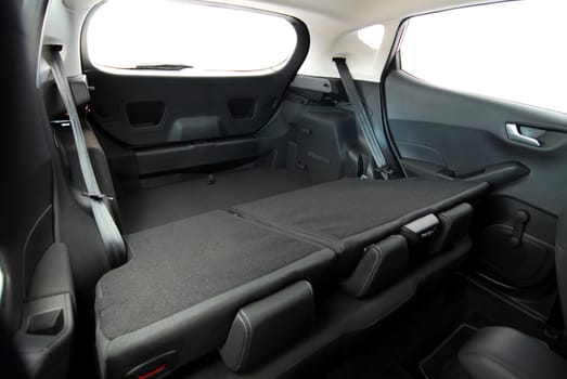 passenger car trunk with rear seats folded