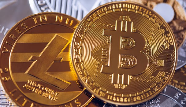 Set of cryptocurrencies with Bitcoin, Etherium, Ripple, Litecoin. Cryptocurrencys new digital money. Bitcoin on the front as the leader. Bitcoin as most important cryptocurrency.