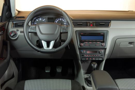 studio shot passenger car interior, front view