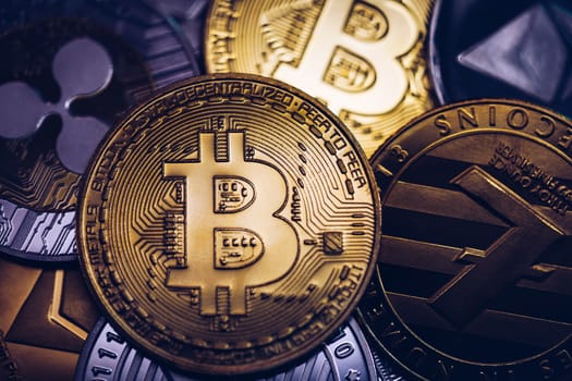 Set of cryptocurrencies with Bitcoin, Etherium, Ripple, Litecoin. Cryptocurrencys new digital money. Bitcoin on the front as the leader. Bitcoin as most important cryptocurrency.