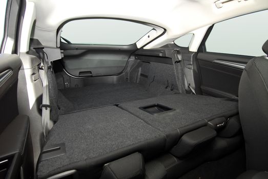 passenger car trunk with rear seats folded