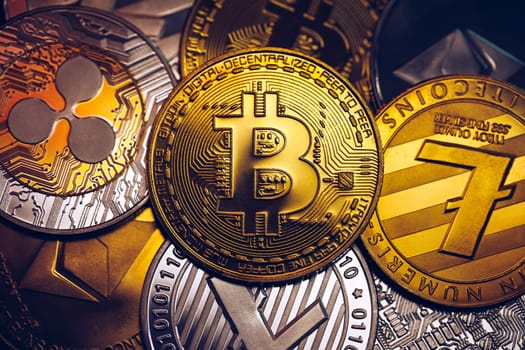 Set of cryptocurrencies with Bitcoin, Etherium, Ripple, Litecoin. Cryptocurrencys new digital money. Bitcoin on the front as the leader. Bitcoin as most important cryptocurrency.