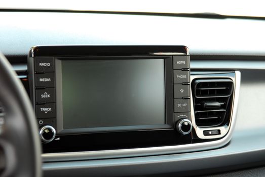 Modern car dashboard. Screen multimedia system. Interior detail