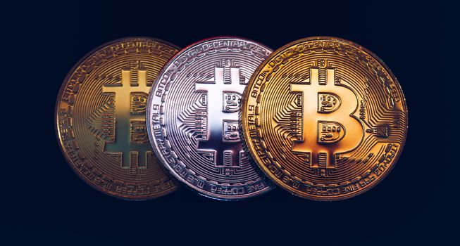 Bitcoin cryptocurrency (crypto currency). Silver Bitcoin and golden Bitcoin symbol. Bitcoin (BTC) cryptocurrency.