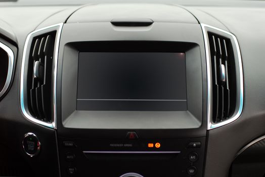 Modern car dashboard. Screen multimedia system. Interior detail